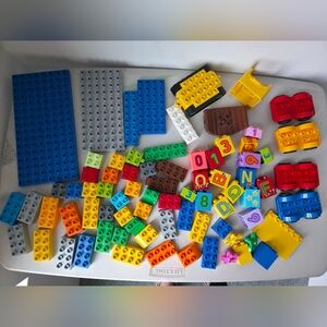 assorted lot of duplo lego pieces